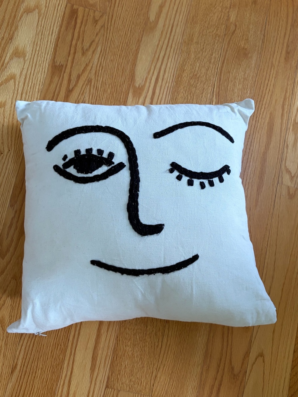 Winking Face Embroidered Throw Pillow - Off White with Black Accent
